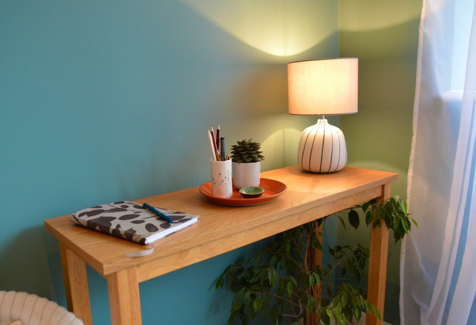 A lamp on a console table in the assessment room